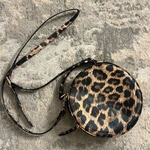 Small round cheetah print bag